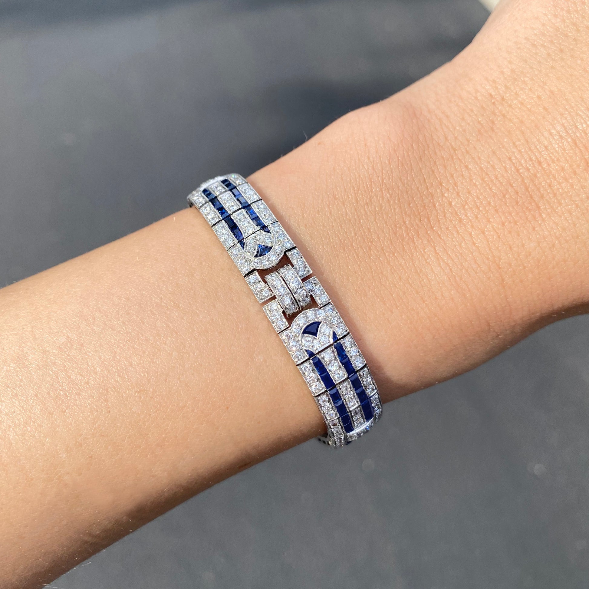 Tiffany & Co. Art Deco Platinum Sapphire & Diamond Bracelet worn on wrist