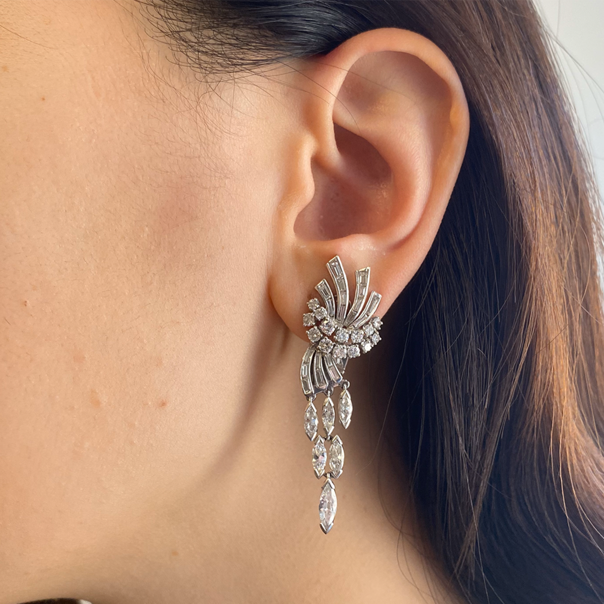 1950s Platinum Diamond Earrings worn on ear