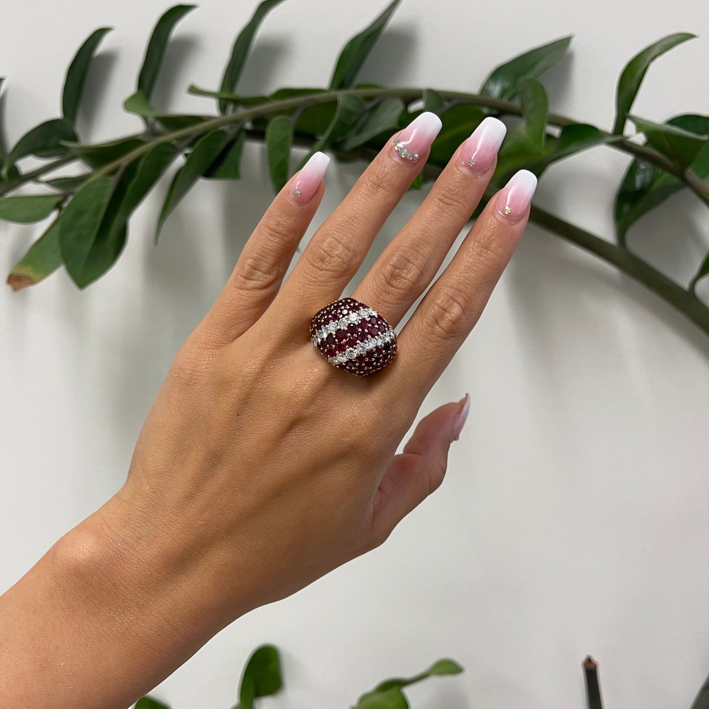 1980s 18KT Yellow Gold Ruby & Diamond Bombe Ring worn on hand