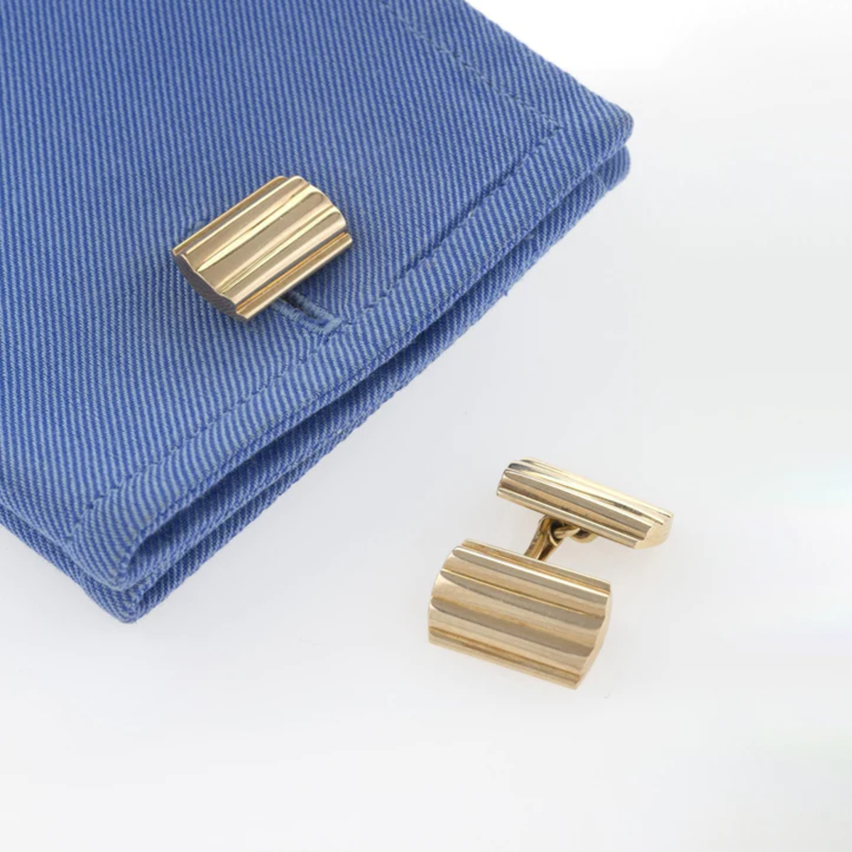 Tiffany & Co. 1950s 14KT Yellow Gold Ribbed Cufflinks worn on cuff