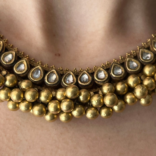 Indian Post-1980s 22KT Yellow Gold Diamond Necklace close-up on neck