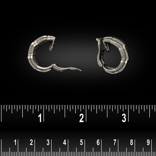 French Van Cleef & Arpels Post-1980s 18KT White Gold Diamond Wave Hoop Earrings side view with ruler