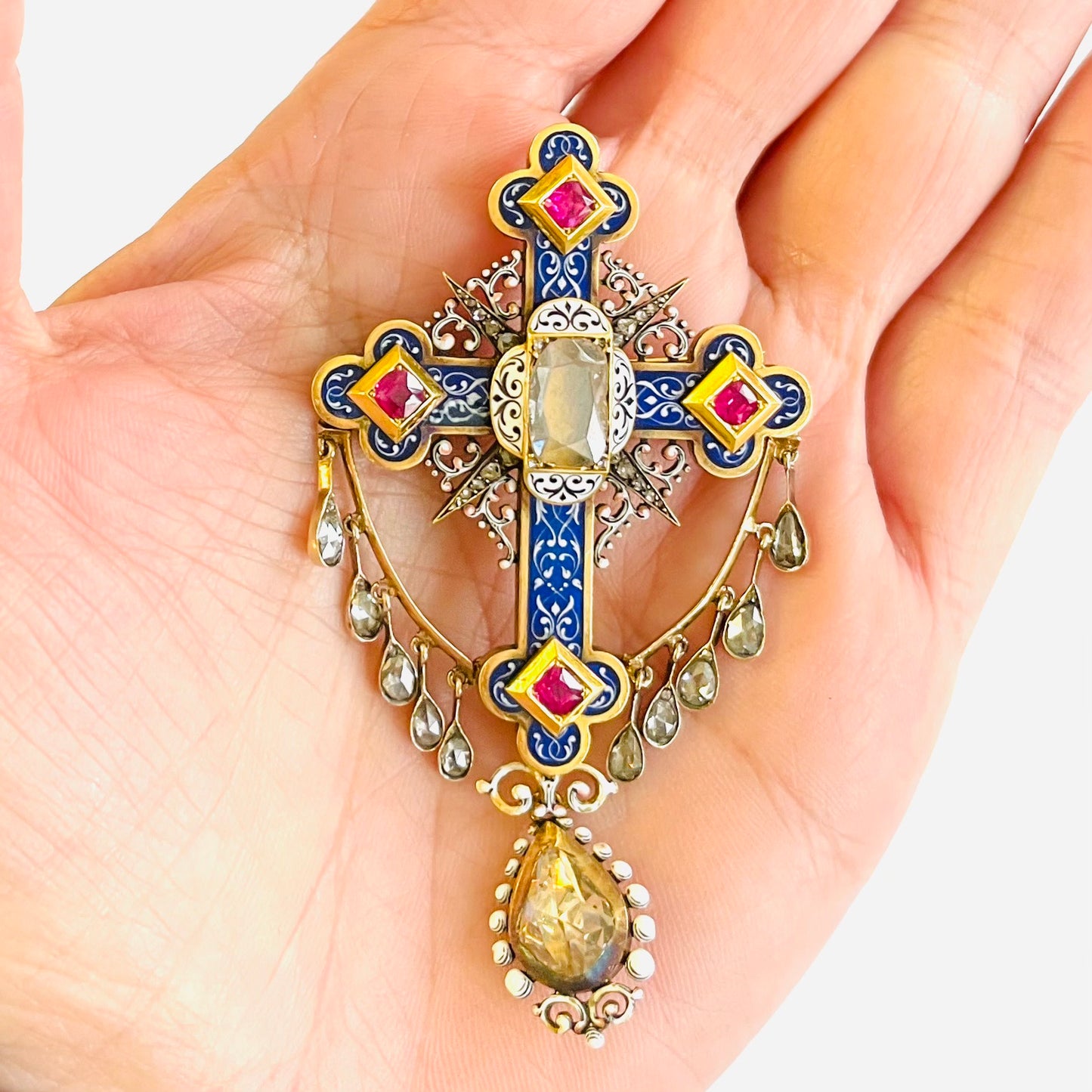 French Victorian 18KT Yellow Gold Diamond, Enamel & Ruby Cross Pendant Brooch in hand