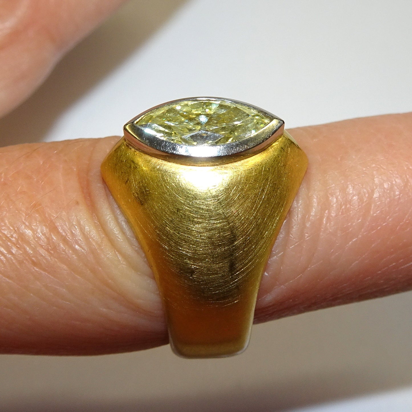 1970s 22KT Yellow Gold Yellow Diamond Ring side view on finger
