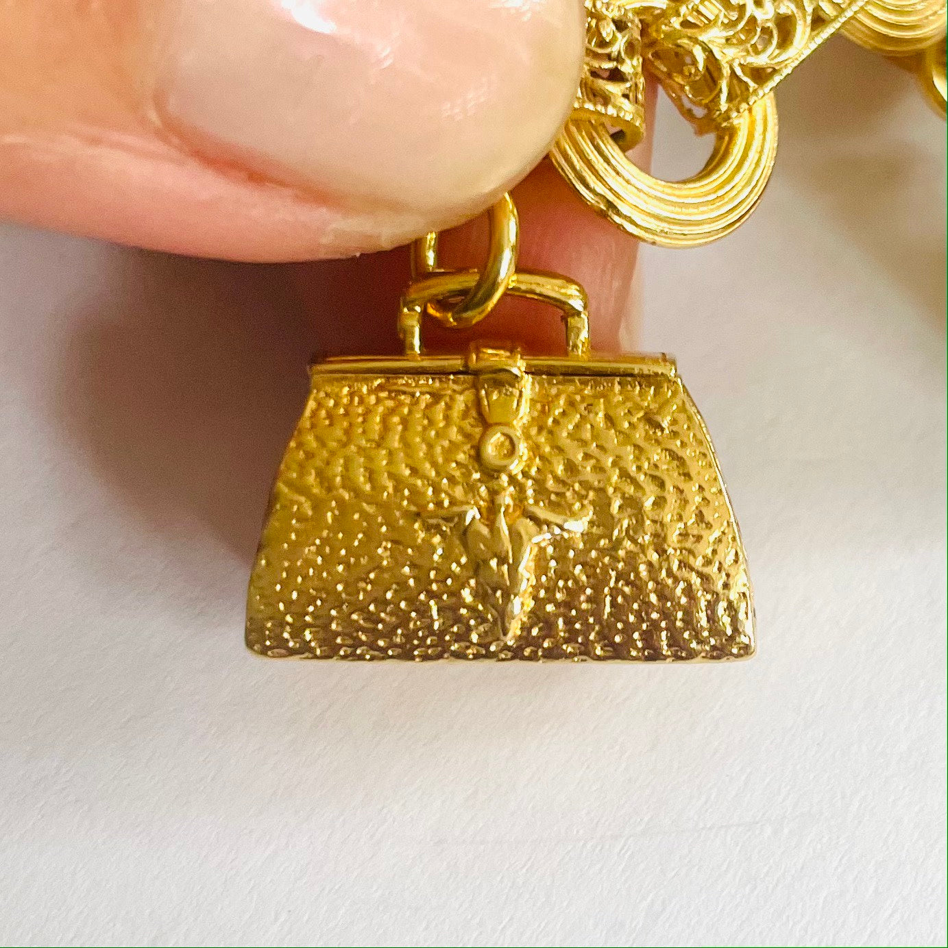 1950s 9KT Yellow Gold Charm Bracelet charm close-up
