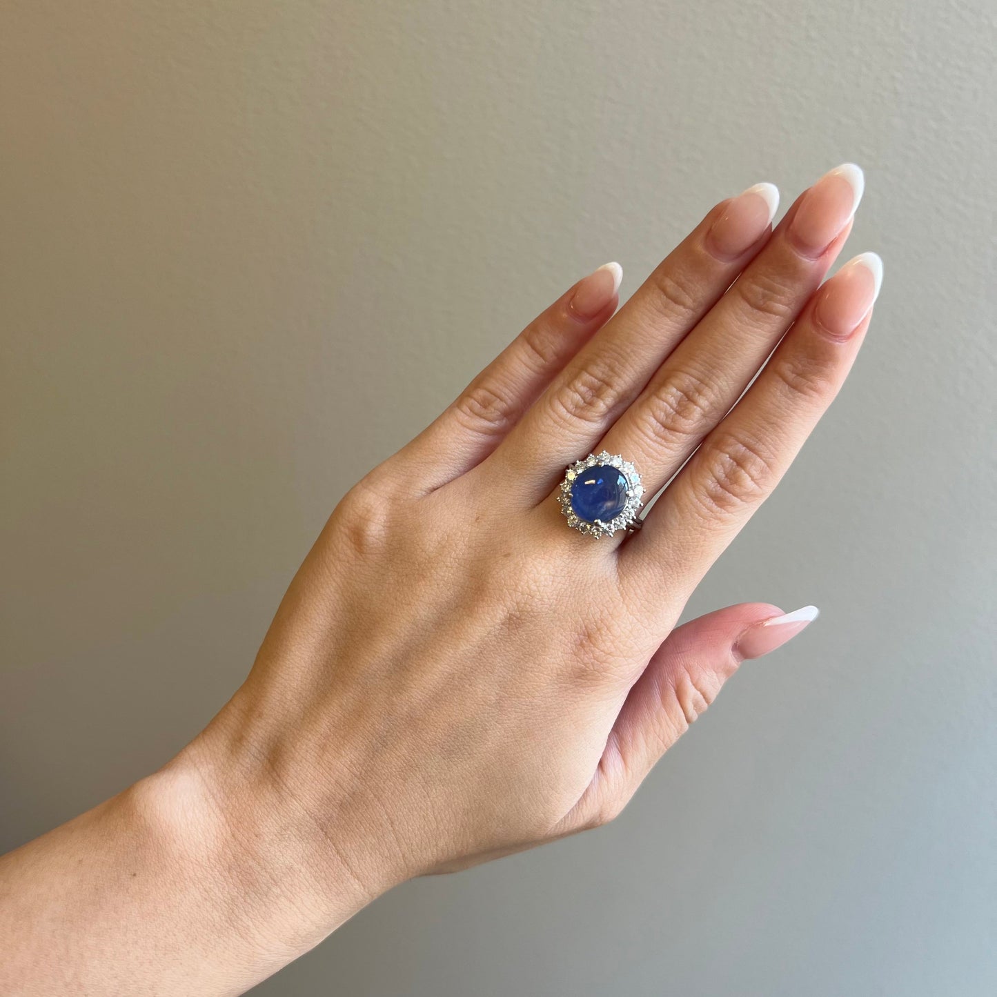 Post-1980s Platinum Sapphire & Diamond Ring worn on finger