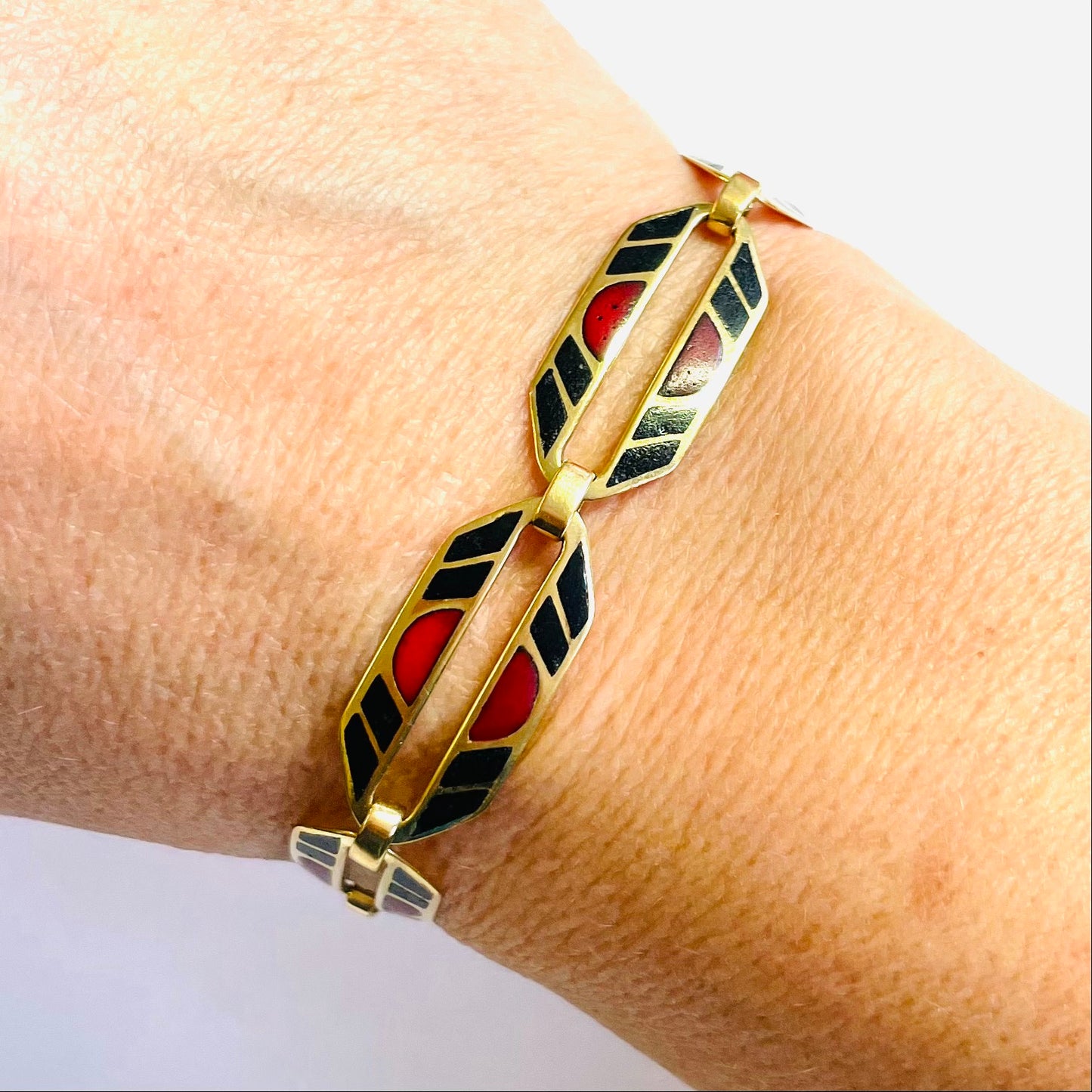 French 1950s 18KT Yellow Gold Enamel Bracelet worn on wrist