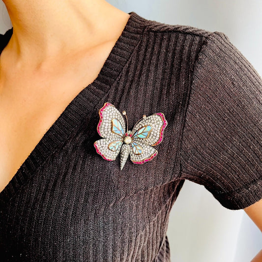 Contemporary Silver & 18KT Yellow Gold Diamond, Opal & Ruby Butterfly Brooch worn on blouse