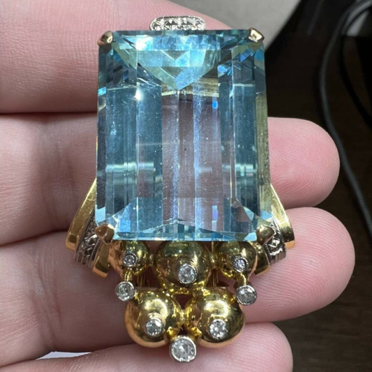 Retro 18KT Yellow Gold Aquamarine & Diamond Brooch in hand