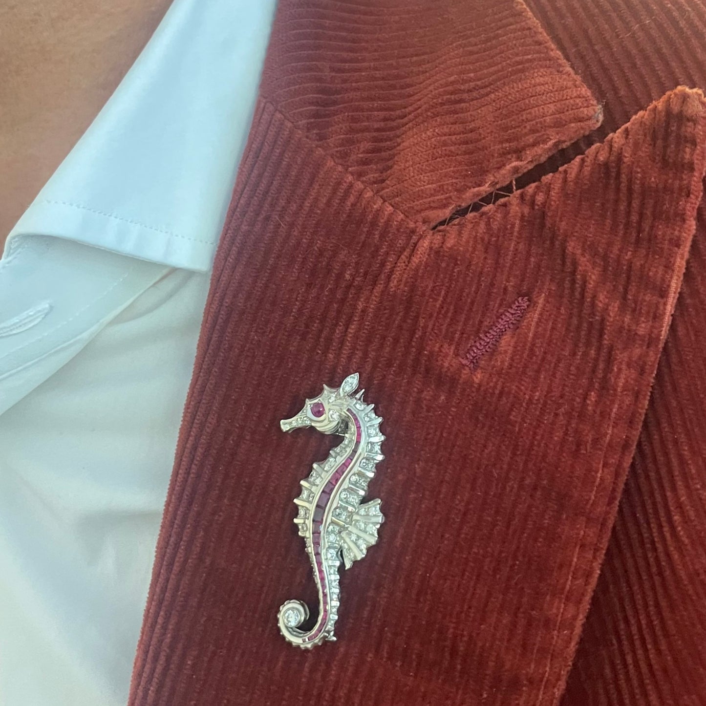 Fontana 1930s Rhodium Plated Ruby & Diamond Seahorse Brooch on lapel