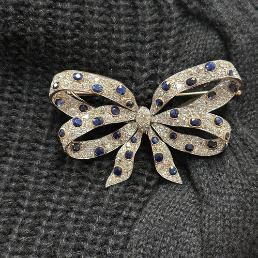 Chaumet Edwardian Platinum & 18KT Yellow Gold Sapphire & Diamond Bow Brooch on shirt