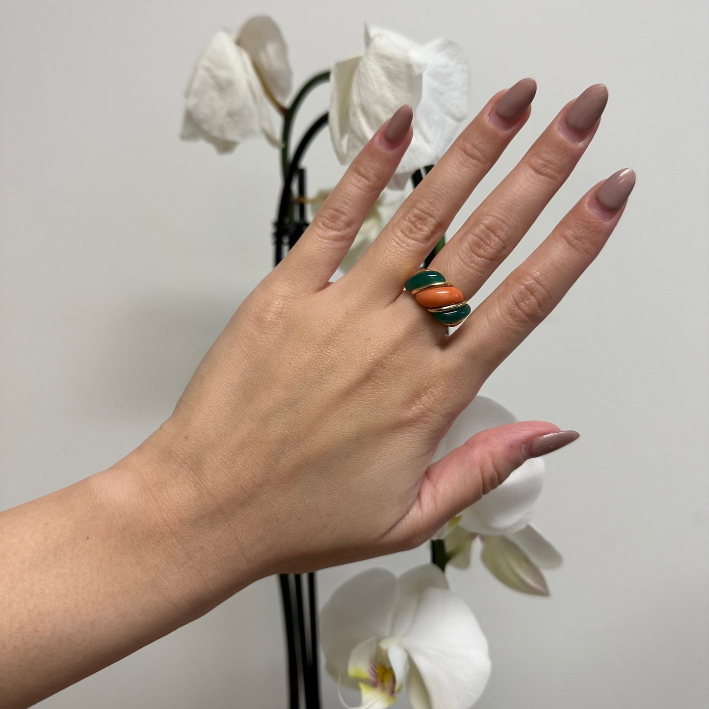 Van Cleef & Arpels French 1980s 18KT Yellow Gold Chalcedony & Coral Ring on finger