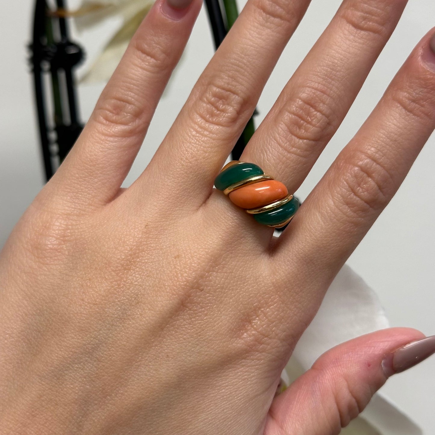 Van Cleef & Arpels French 1980s 18KT Yellow Gold Chalcedony & Coral Ring on finger