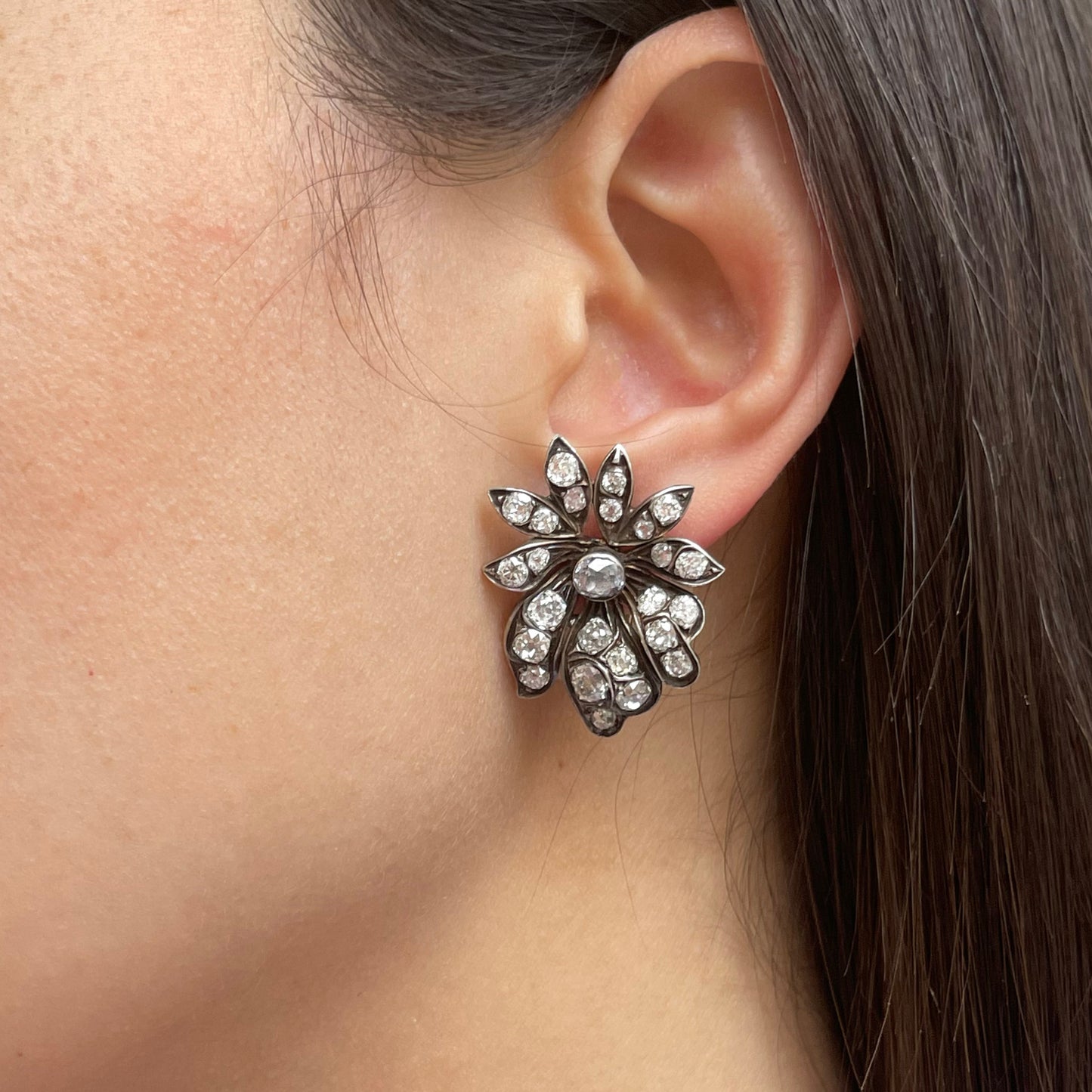 Victorian Silver & 18KT Yellow Gold Diamond Earrings on ear