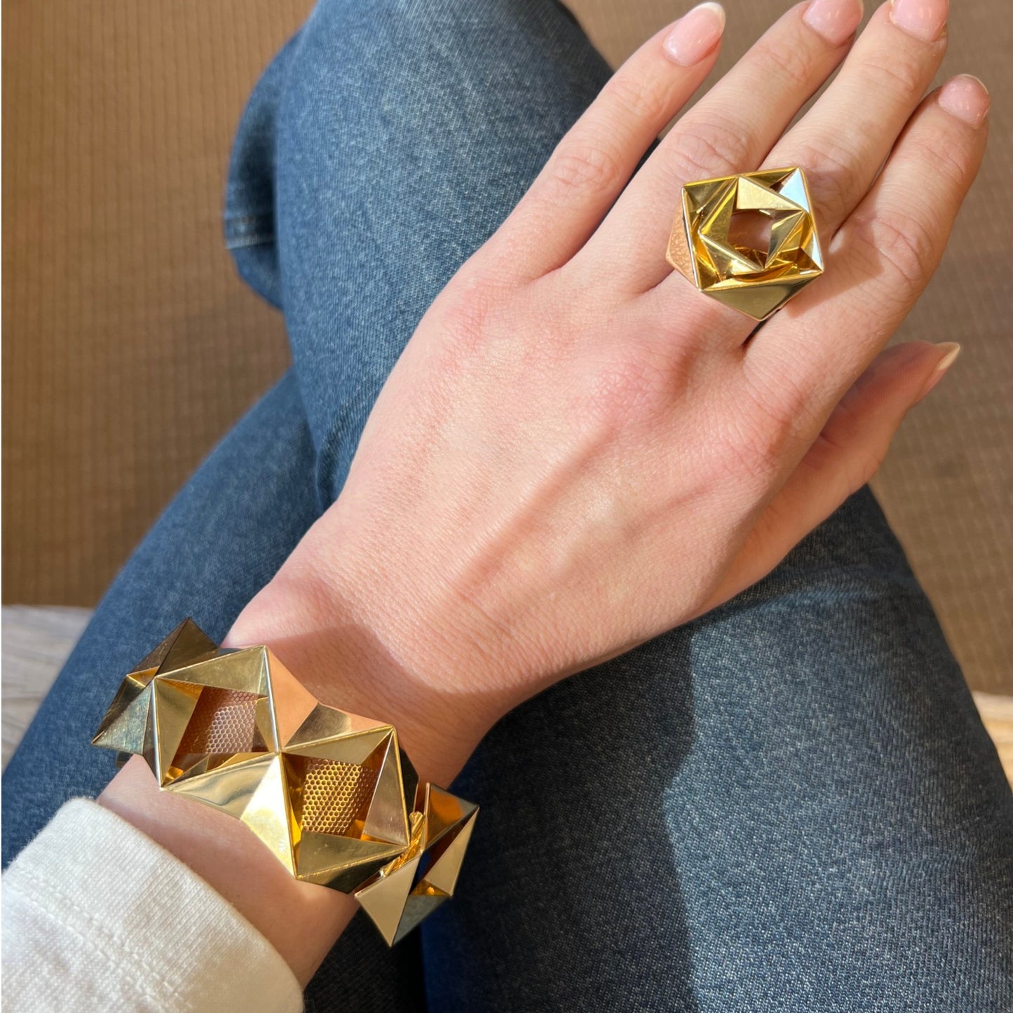 1980s 18KT Yellow Gold "Origami" Bracelet & Ring Set on wrist and finger