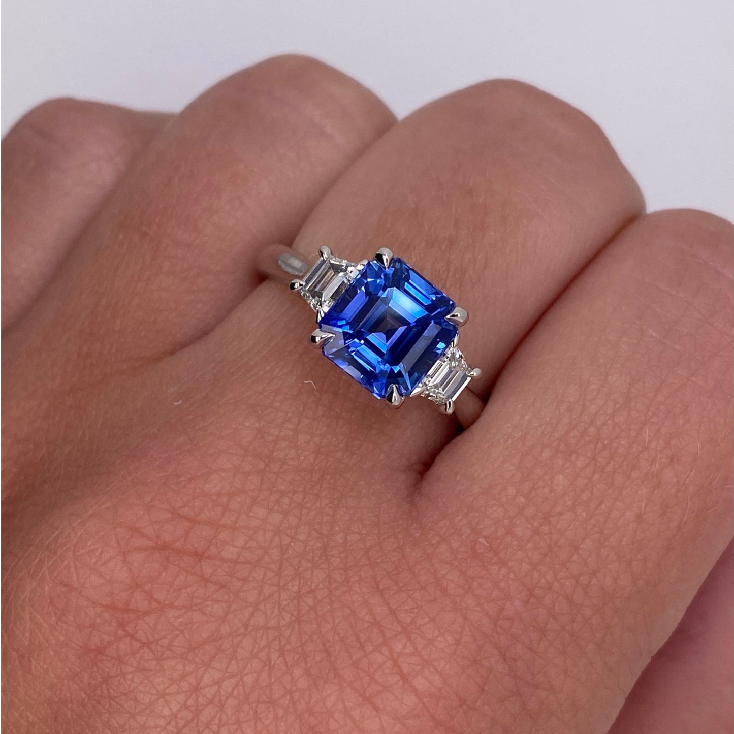 Contemporary Platinum Sapphire & Diamond Ring on finger