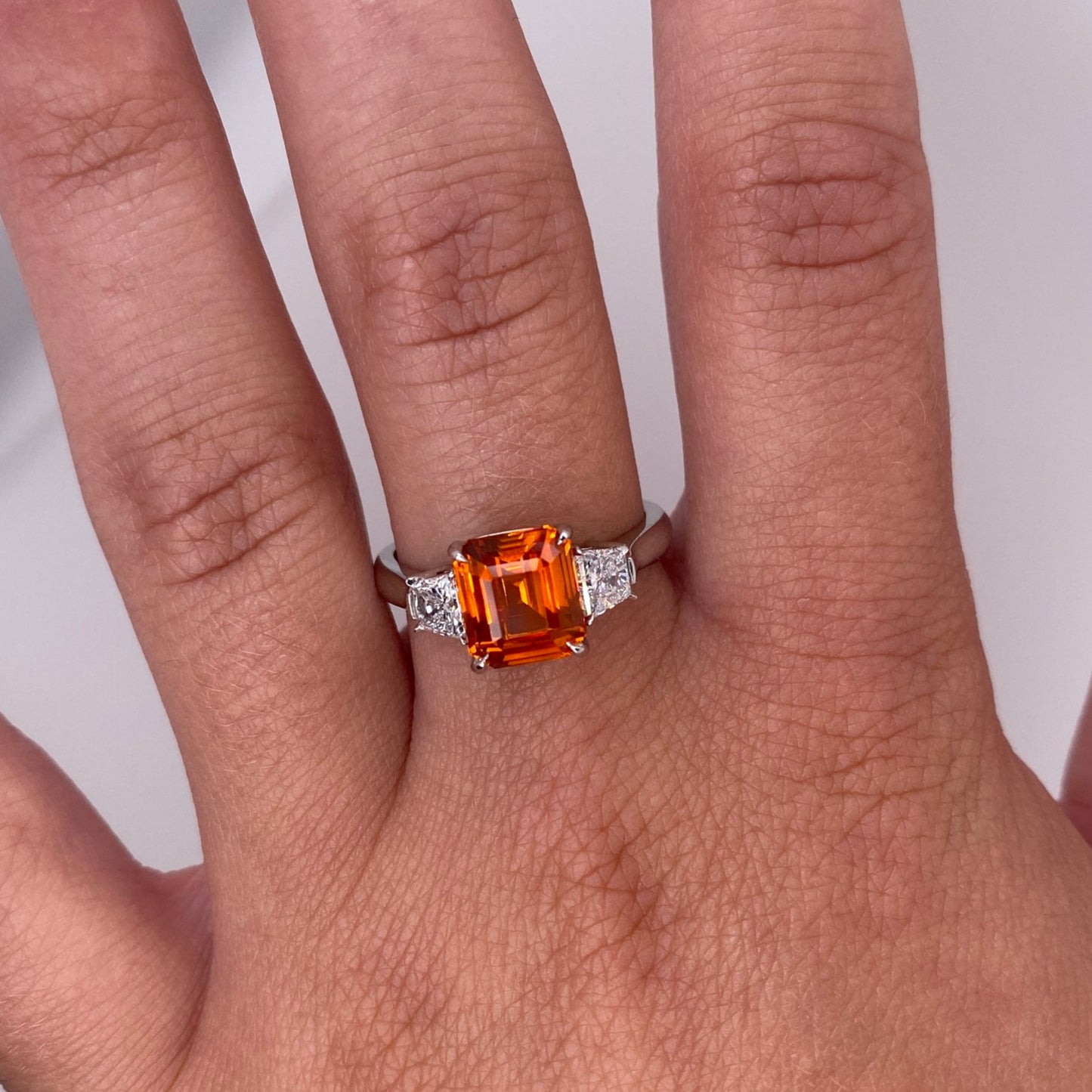Contemporary Platinum Sapphire & Diamond Ring on finger