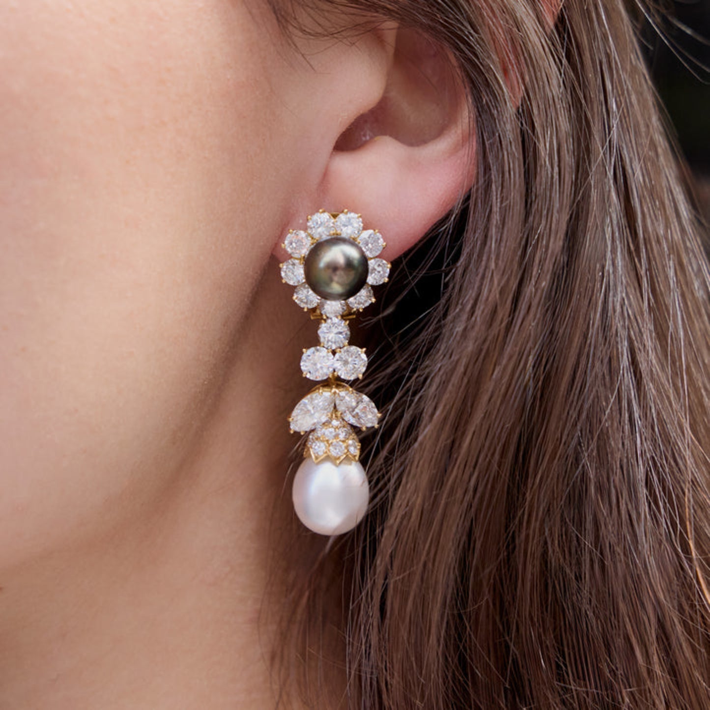 Van Cleef & Arpels France 1980s 18KT Yellow Gold Cultured Pearl & Diamond Earrings on ear