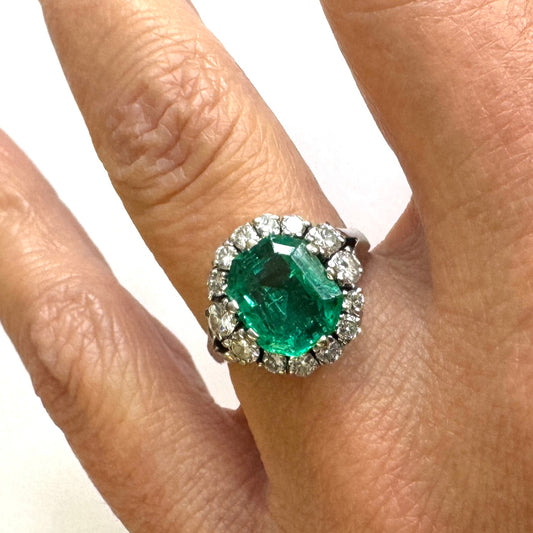 1960s 18KT White Gold Emerald & Diamond Ring on finger