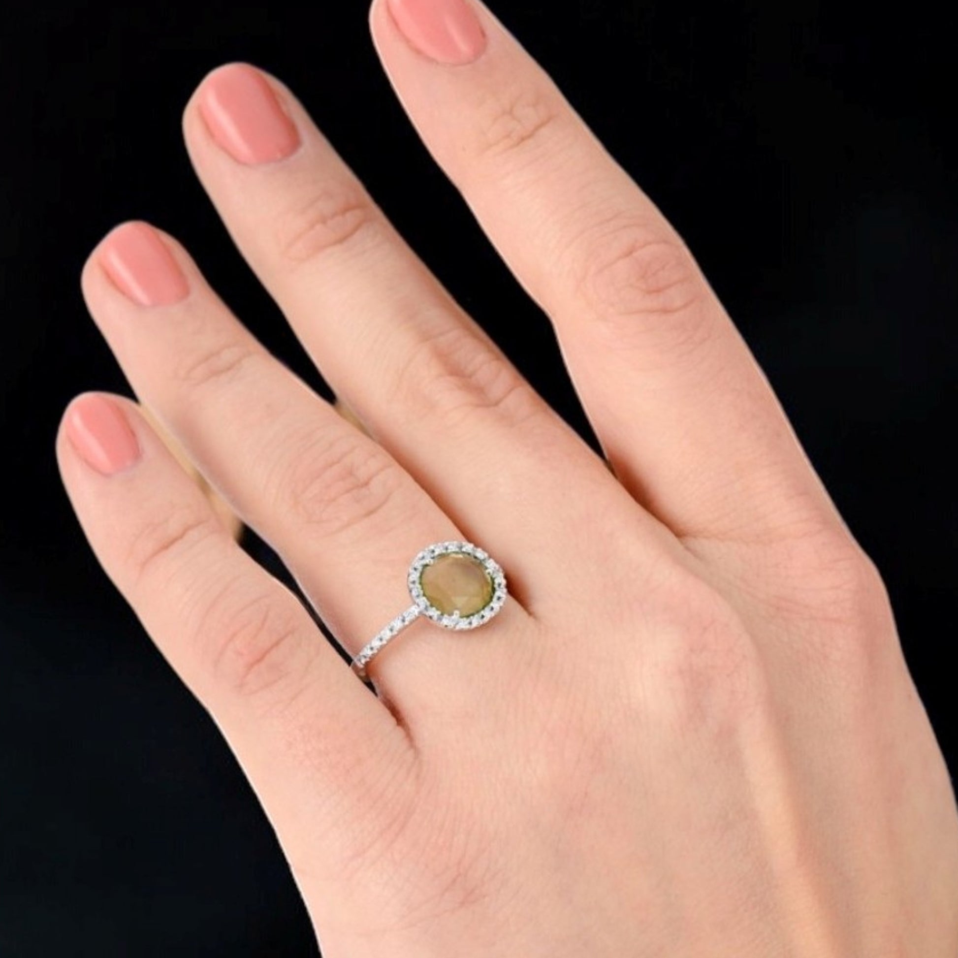 Pomellato Post-1980s 18KT White Gold Peridot & Diamond Colpo di Fulmine Ring on finger