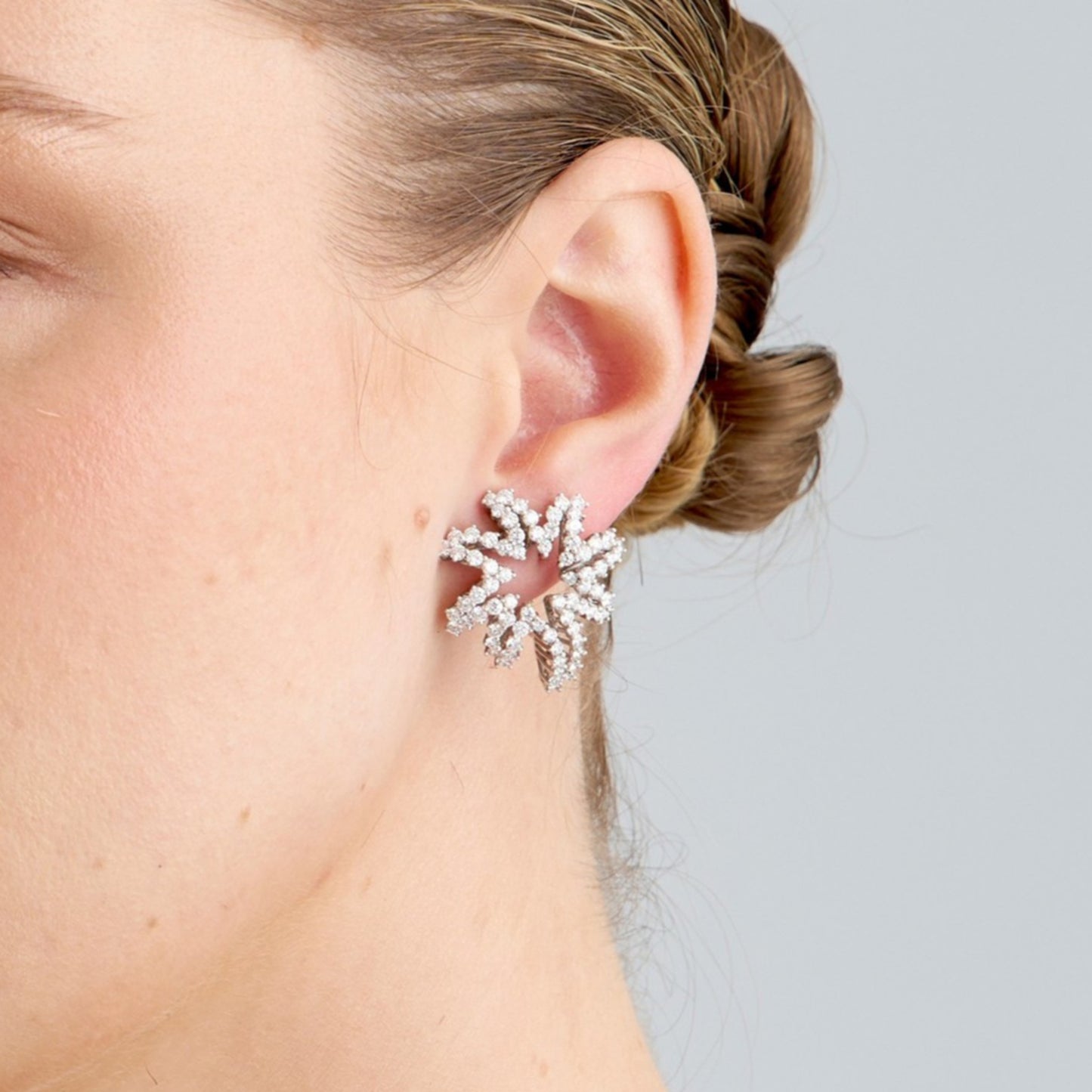 Tiffany & Co. Post-1980s Platinum & 18KT Yellow Gold Diamond Fireworks Earrings on ear