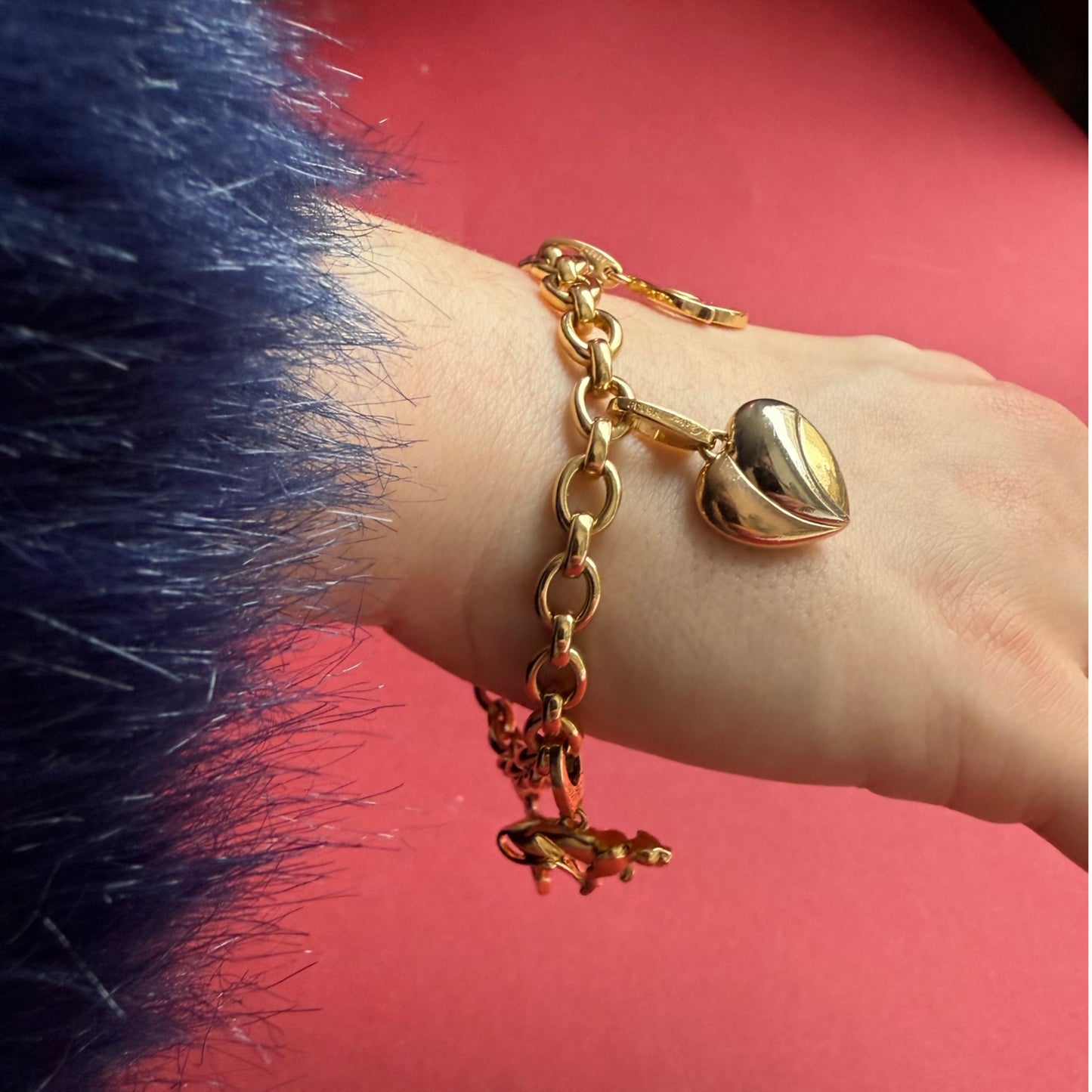 Cartier Post-1980s 18KT Yellow Gold Diamond Charm Bracelet on wrist