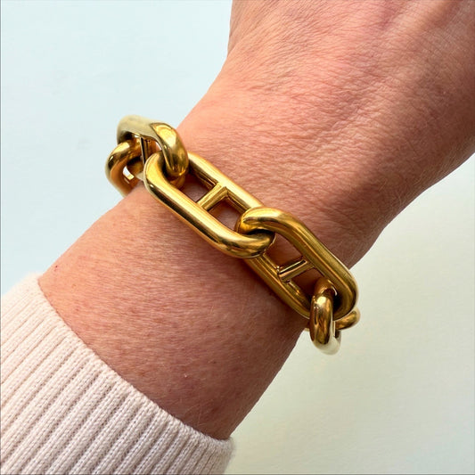 Italian 1960s 18KT Yellow Gold Mariner Bracelet on wrist