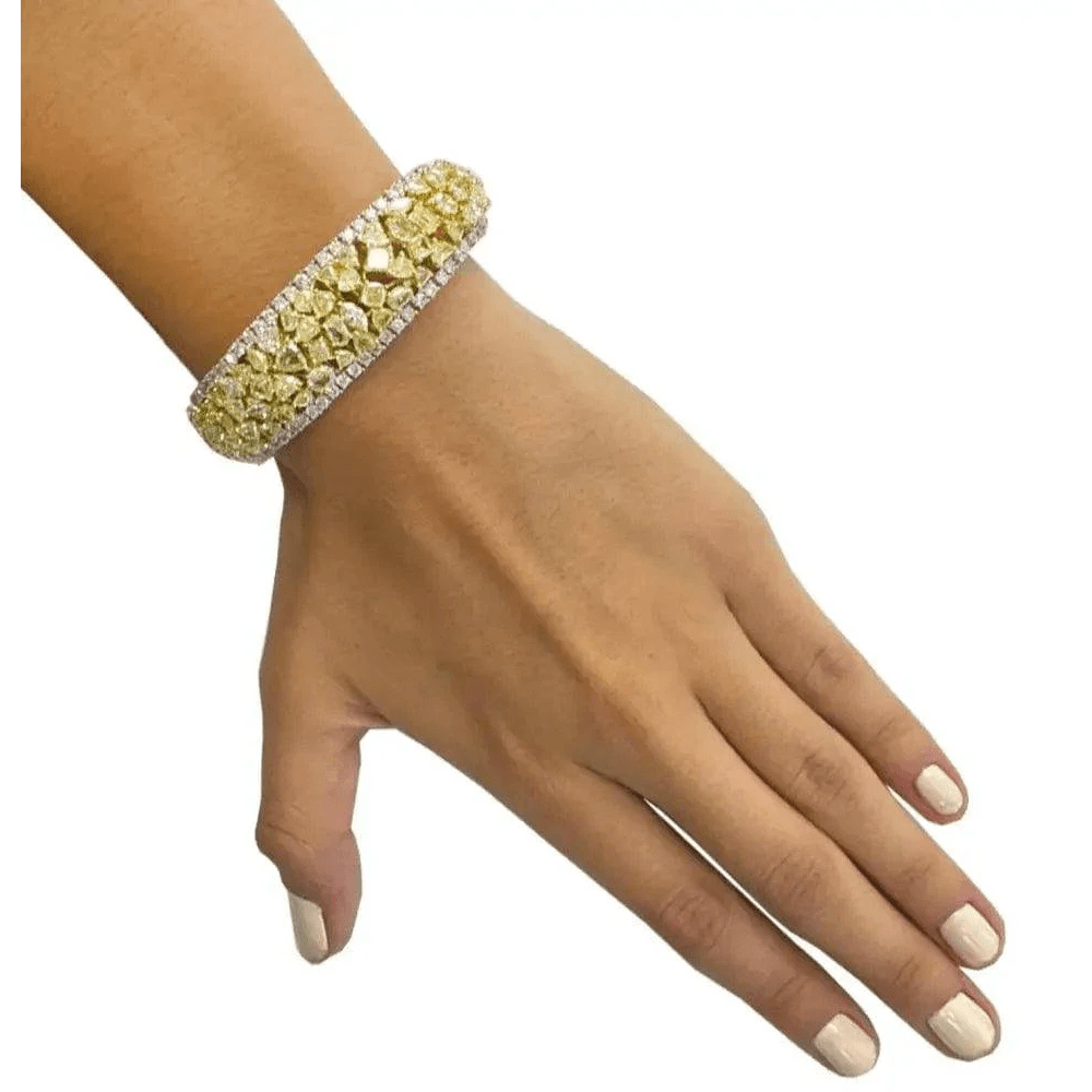 Contemporary 18KT White & Yellow Gold Diamond Bracelet on wrist