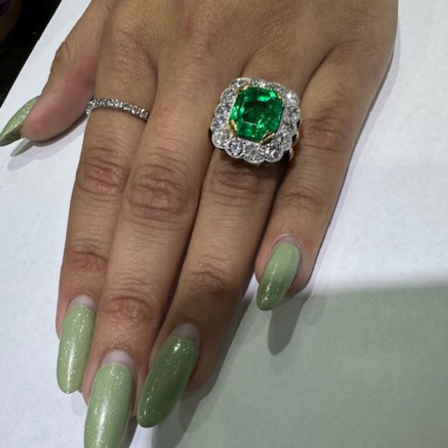 1940s Platinum Emerald & Diamond Ring on finger