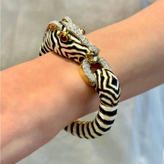 David Webb 1980s Platinum & 18KT Yellow Gold Diamond, Ruby & Enamel Zebra Bracelet on wrist