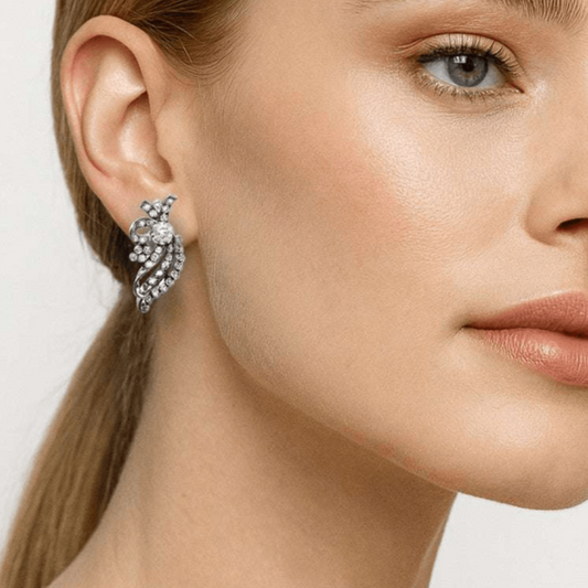1980s Platinum Diamond Earrings on ear