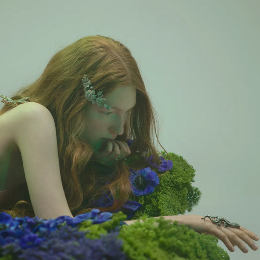 close up of model with jewelry and flowers for Spicer Warin