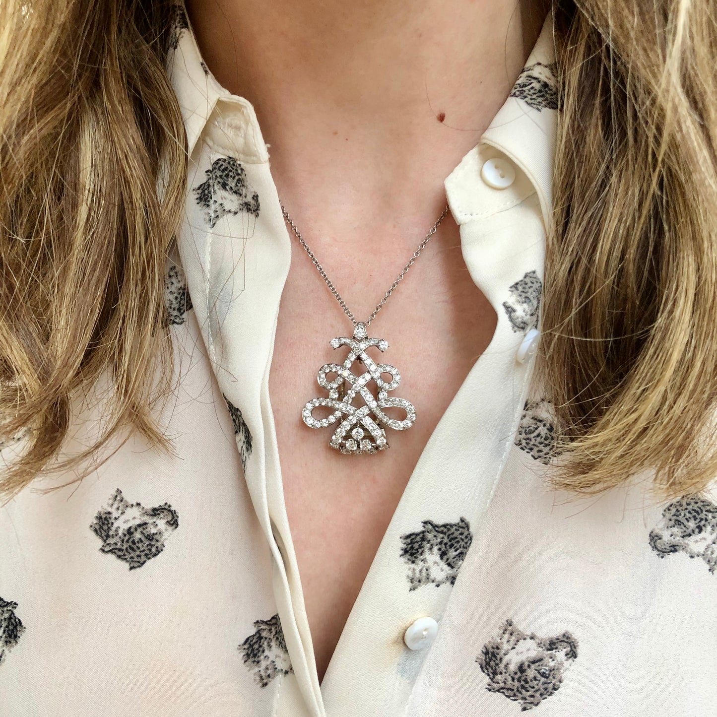 Cartier 1950s Platinum Diamond Brooch worn as pendant on neck