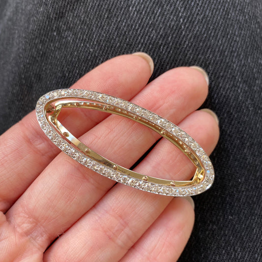 Edwardian Platinum-Topped 18KT Yellow Gold Diamond Barrette in hand