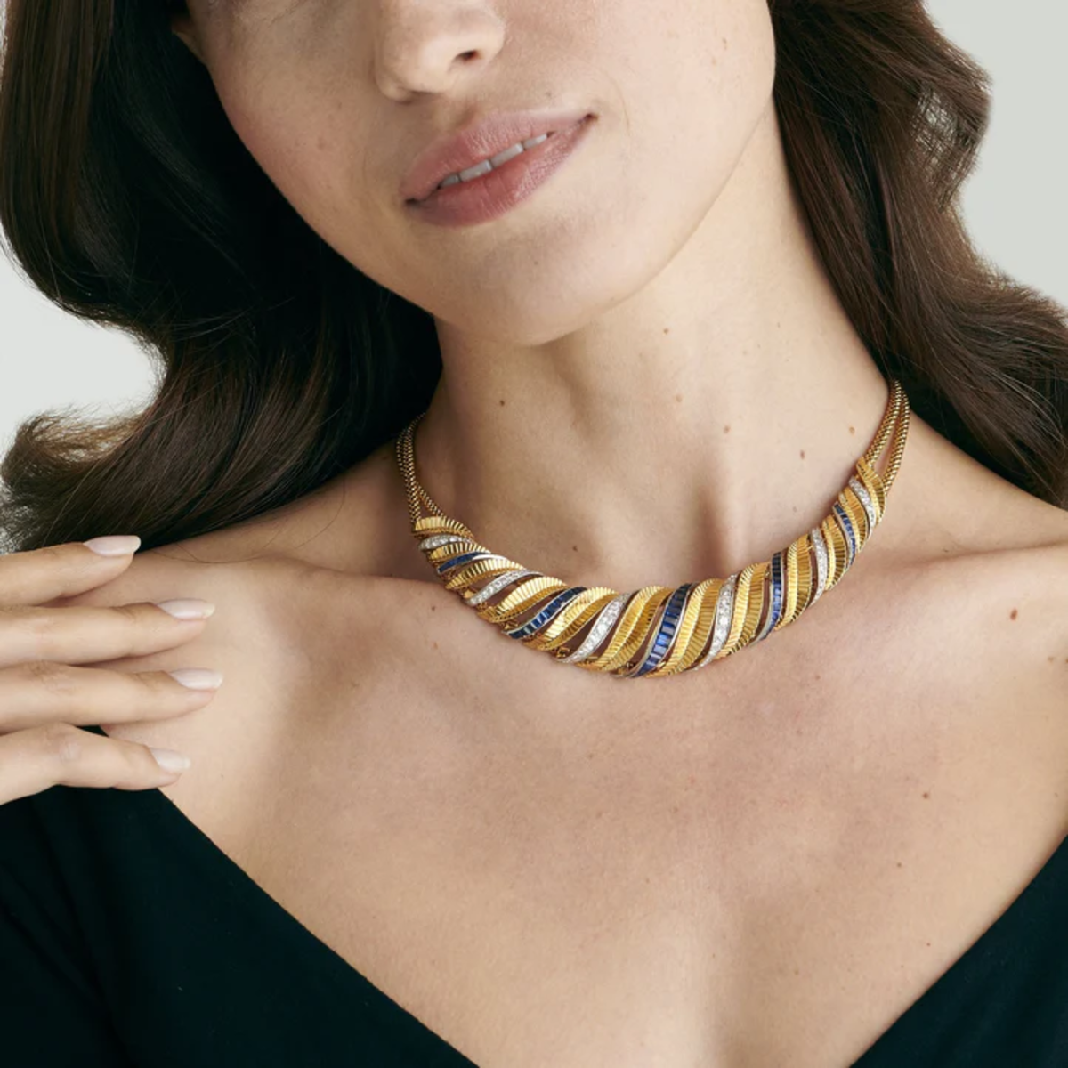 1940s Platinum & Yellow Gold Diamond & Sapphire Torsade Necklace worn on neck