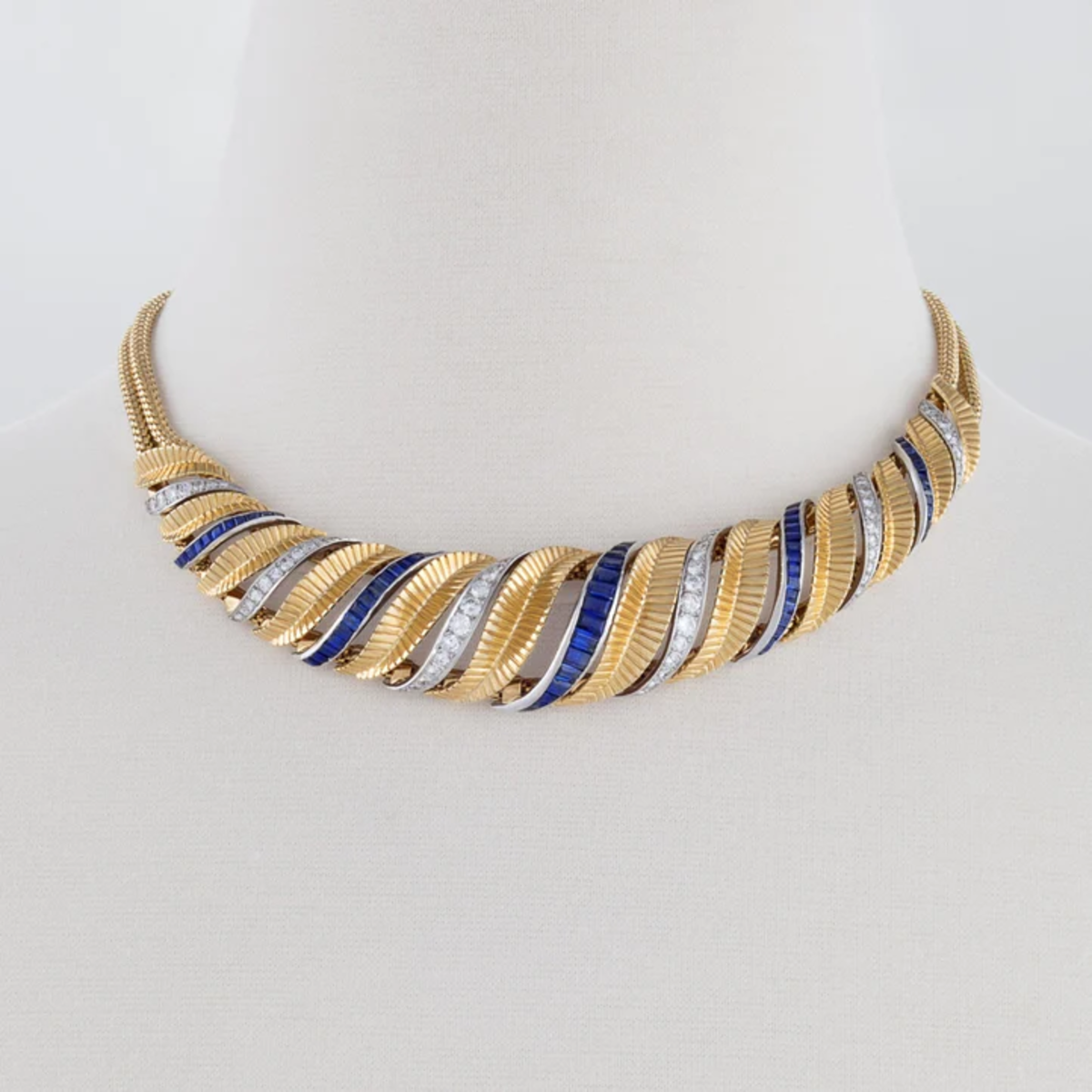 1940s Platinum & Yellow Gold Diamond & Sapphire Torsade Necklace front view on form