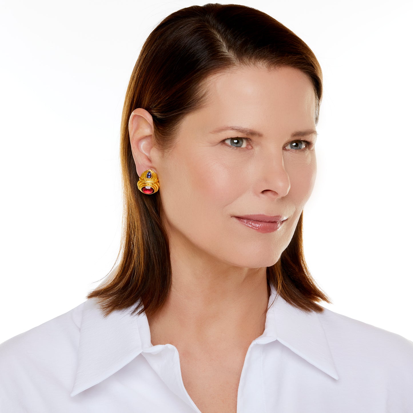 Bulgari 1980s 18KT Yellow Gold Rubellite Tourmaline & Sapphire Earrings being worn