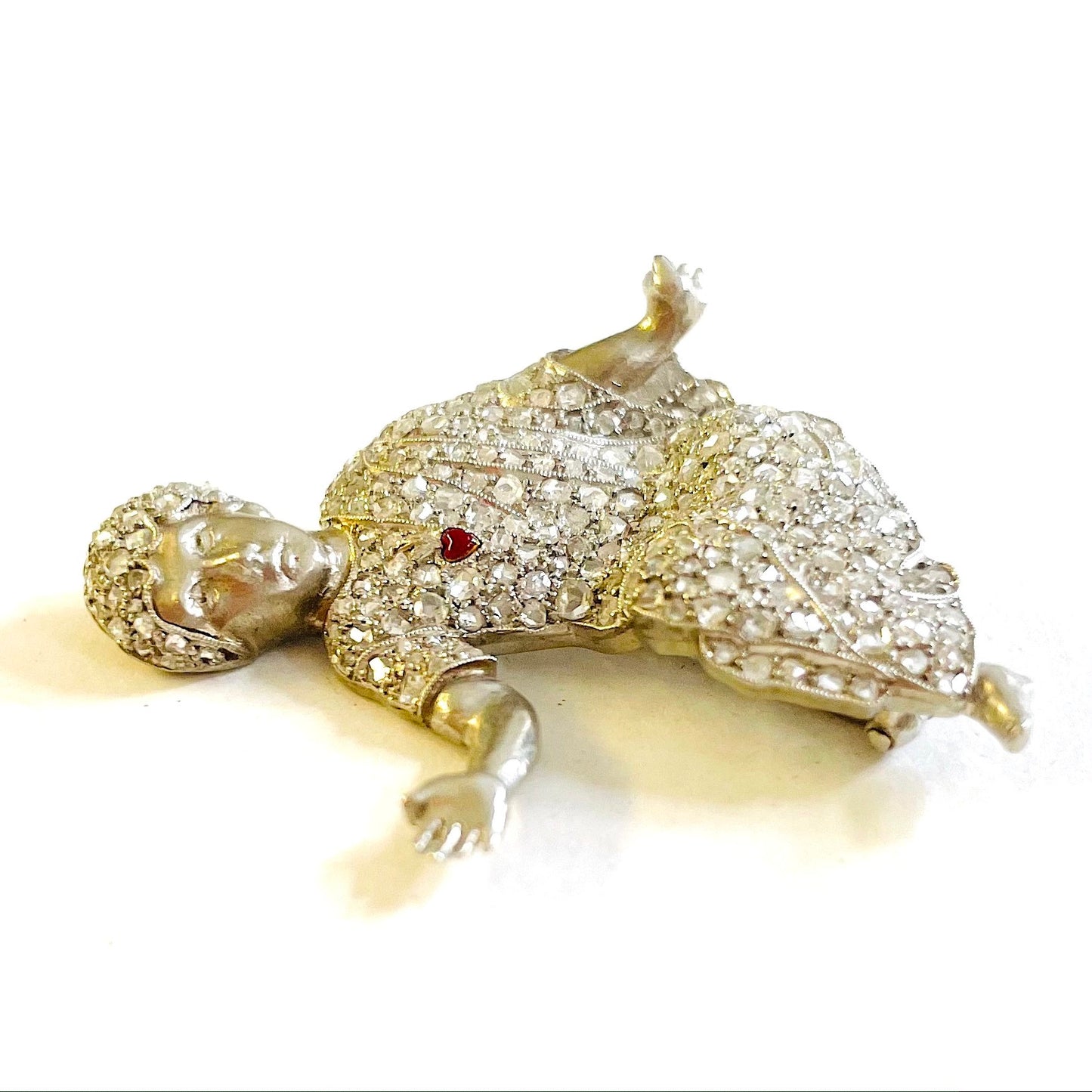 1930s Platinum Diamond & Enamel "Baby" Roman Emperor Brooch profile view
