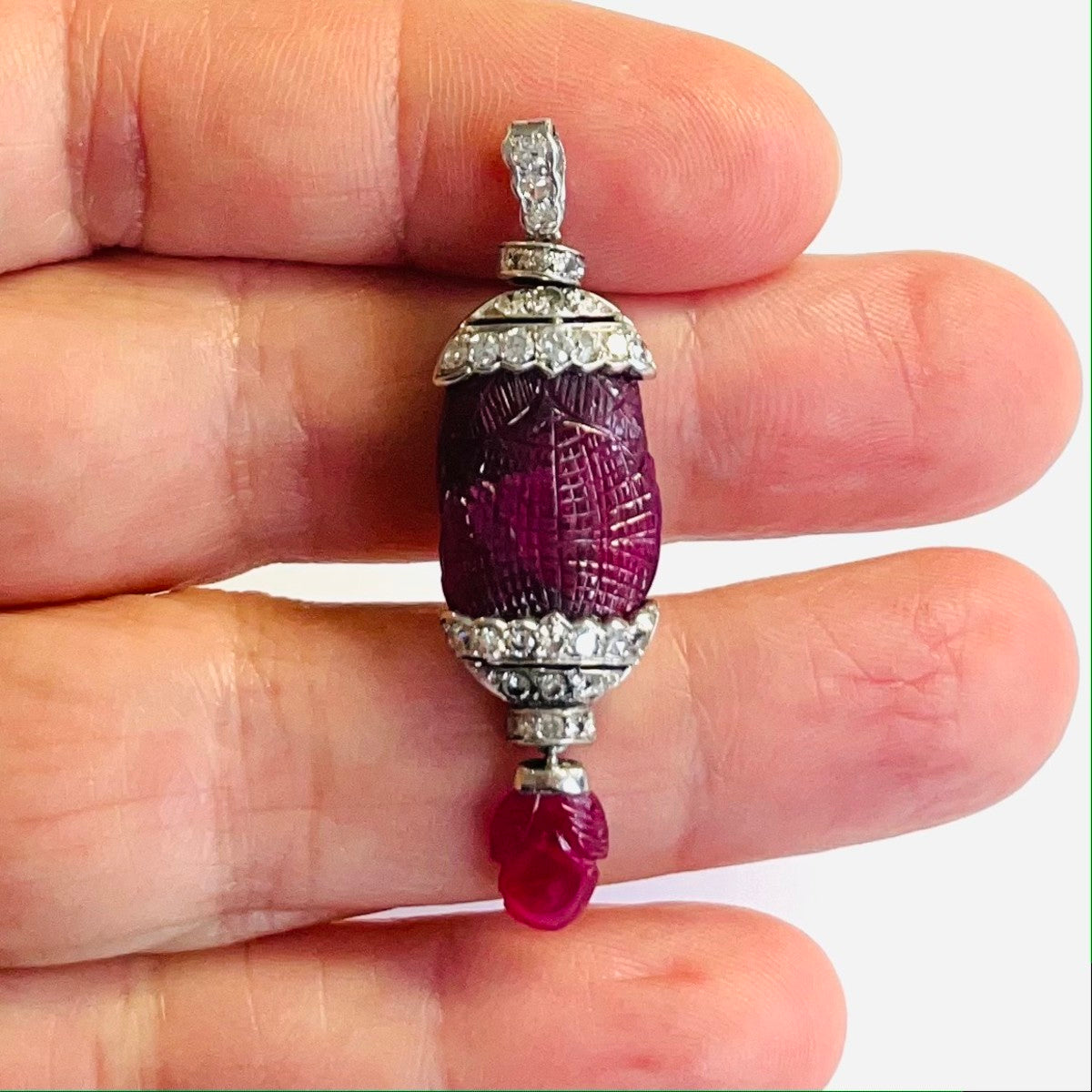 French Art Deco Platinum Unheated Burma Ruby & Diamond Pendant in hand
