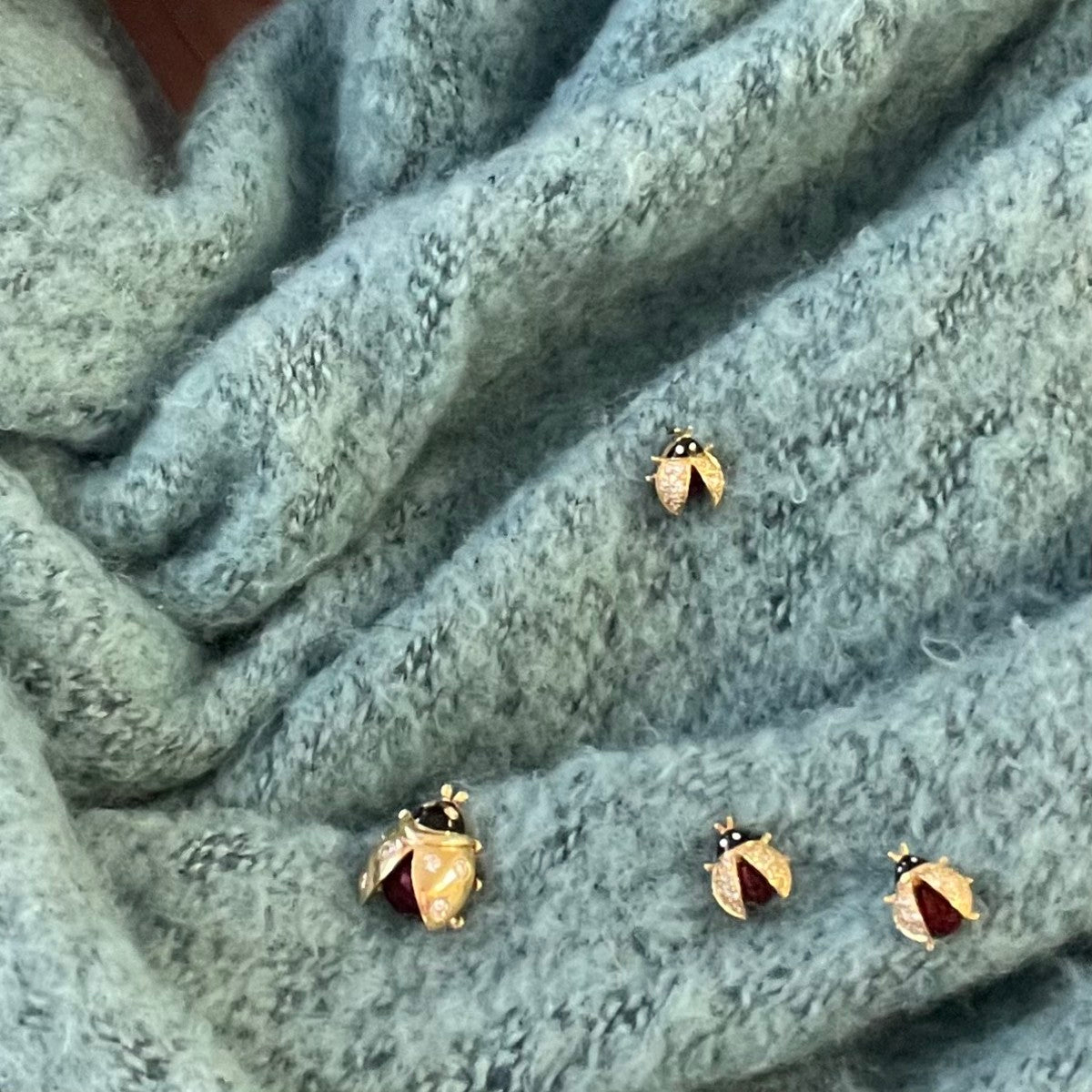 Meister Post-1980s 18KT Yellow Gold Enamel & Diamond Ladybug Brooches worn on scarf