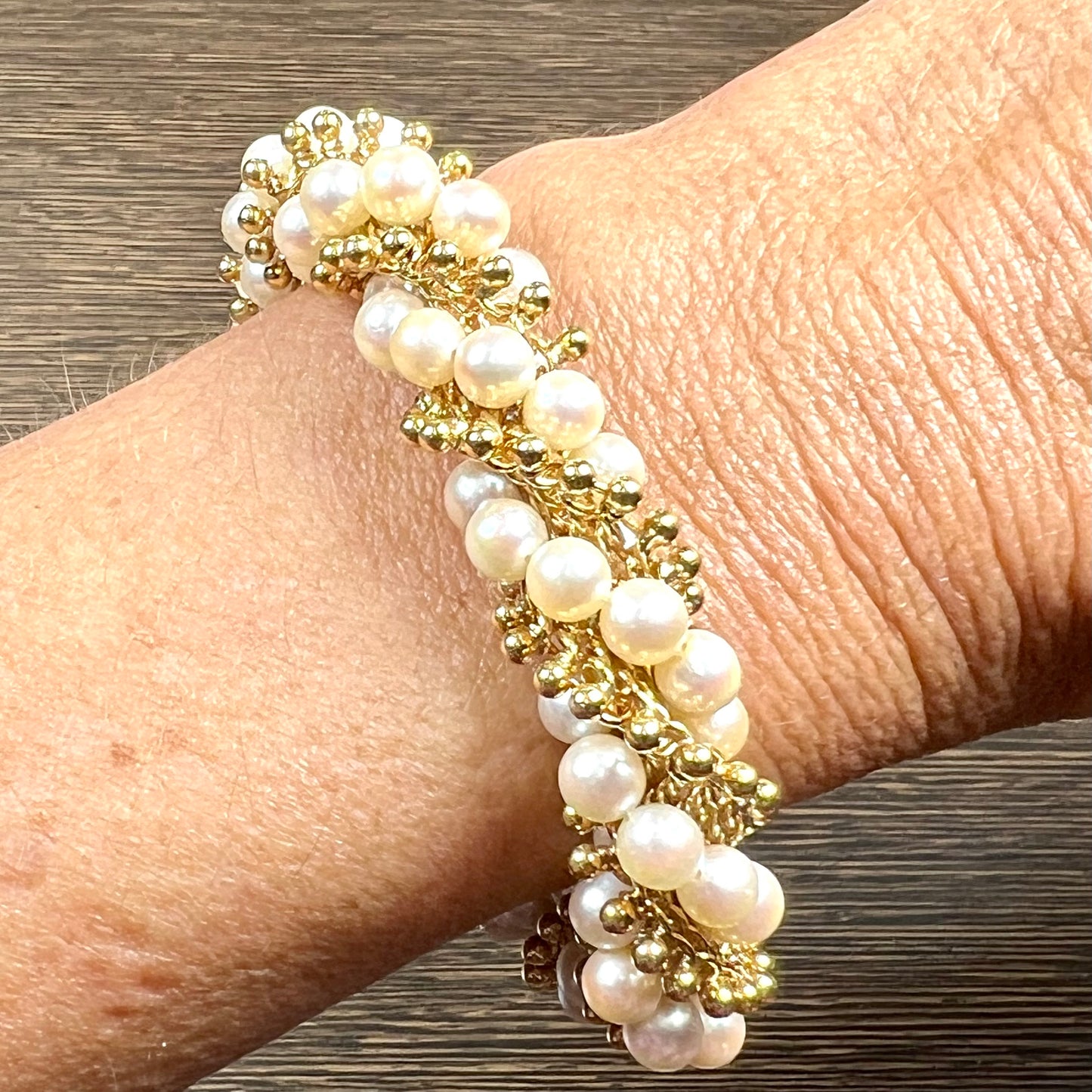 Van Cleef & Arpels Paris Post-1980s 18KT Yellow Gold Pearl & Gold Bracelet worn on wrist