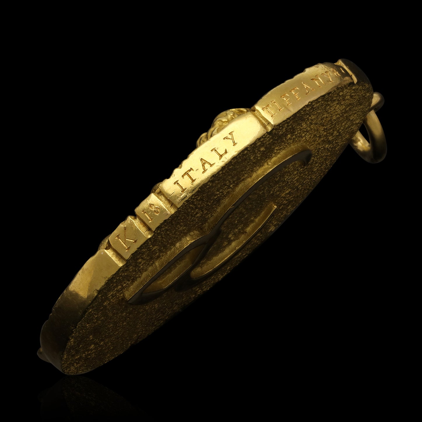 Tiffany & Co. 1970s 18KT Yellow Gold Taurus Pendant close-up of signature