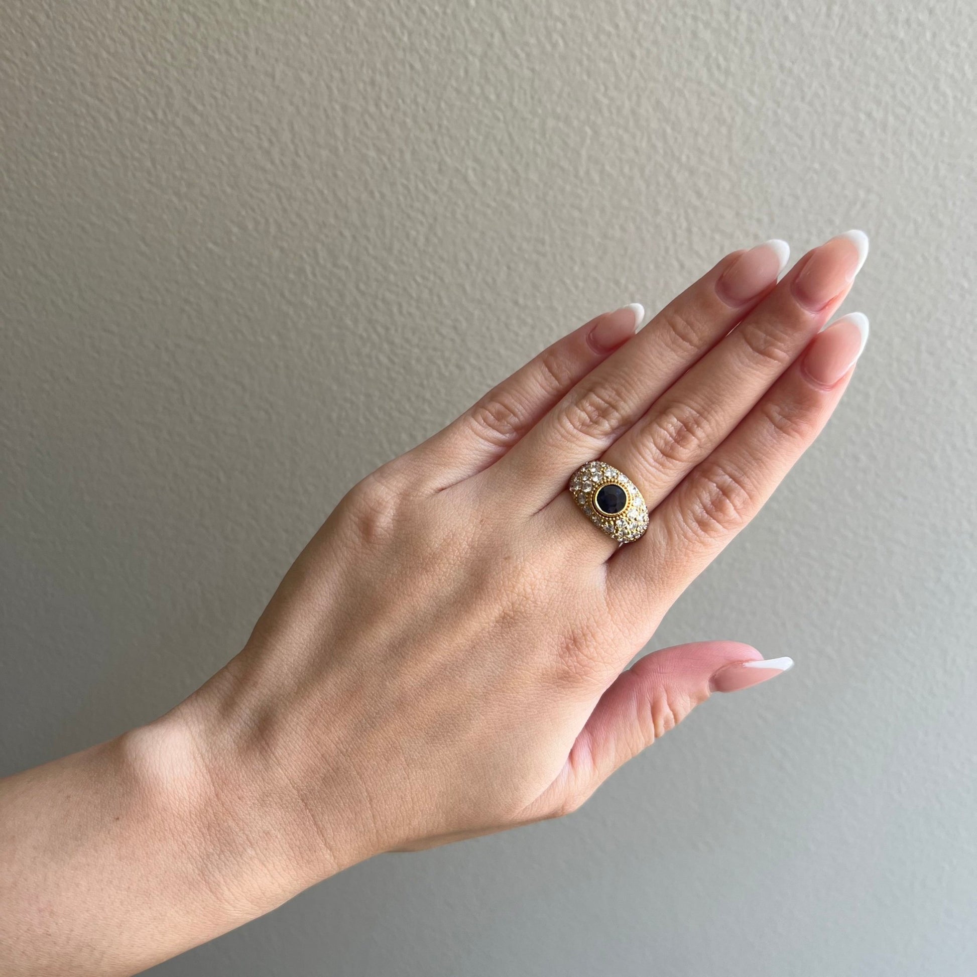 Joseph Marchak 1960s 18KT Yellow Gold Sapphire & Diamond Ring on finger