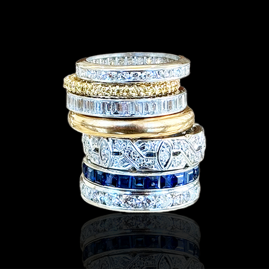 Round diamond and platinum band; Yellow diamond and 18-karat gold band; Baguette diamond and platinum band; Antique 18-karat gold band inscribed 1881; Art Deco diamond and platinum band; Sapphire and platinum band; Diamond and platinum band.