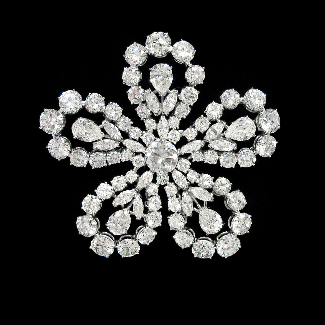 Diamond and platinum brooch, signed Harry Winston, circa 1952.