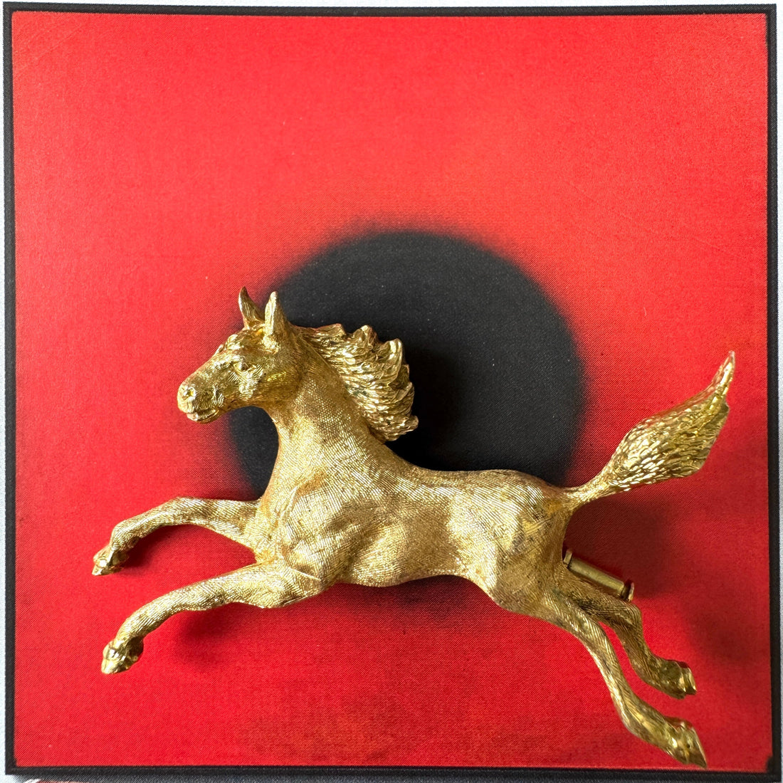 Textured 18-karat gold horse brooch, circa 1970s. 