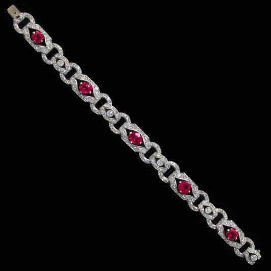 : Art Deco bracelet with 5 cushion unheated Burma rubies, weighing approximately 5.25-carats, diamonds, weighing approximately 6.50 carats, circa 1930s