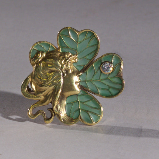 Diamond, plique-a-jour enamel and 18-karat gold, Art Nouveau clover themed brooch, French, circa 1900. 