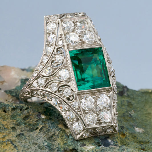 Art Deco 2.85-carat emerald, old European cut diamonds and platinum ring, accompanied by an AGL report stating that the emerald is of Colombian origin with minor traditional clarity enhancement. 