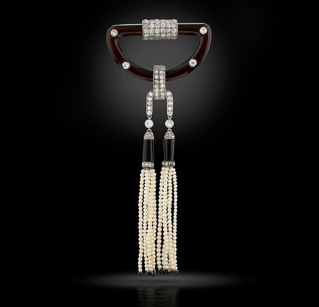 Art Deco diamond, onyx, natural pearl and platinum tassel brooch, signed Cartier, circa 1921